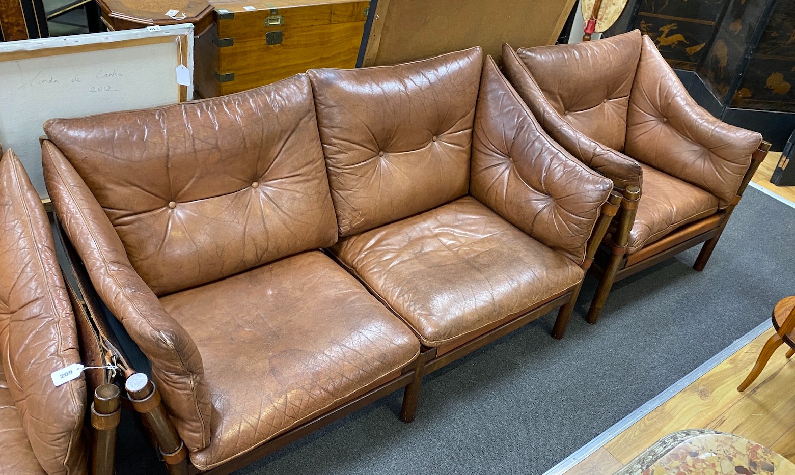 An Arne Norell Ilona settee and two chairs, manufactured by Aneby Mobler in 1960's, settee length 150cm, depth 73cm, height 77cm